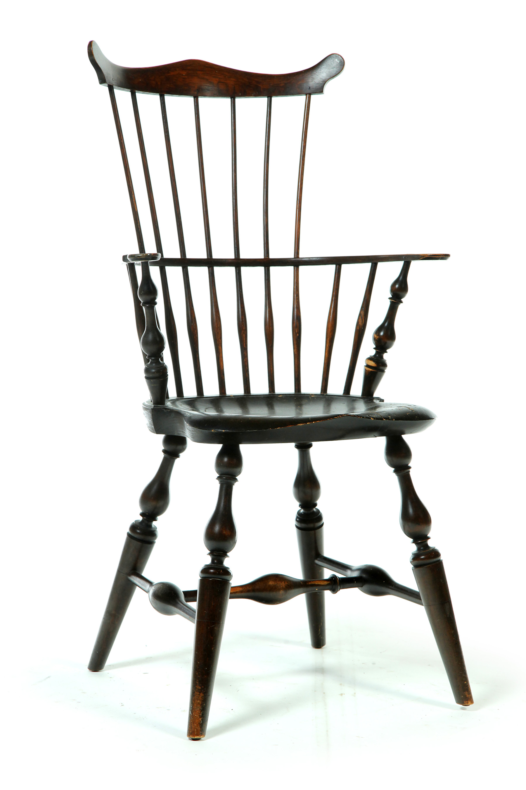 Appraisal: WALLACE NUTTING COMB-BACK WINDSOR ARMCHAIR Labeled early th century mixed