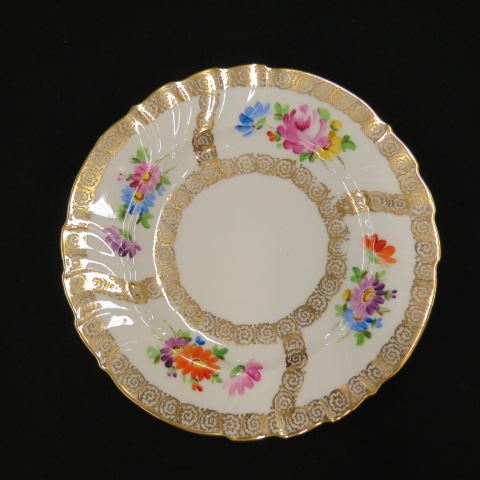 Appraisal: Handpainted German Porcelain Plates floral and gold