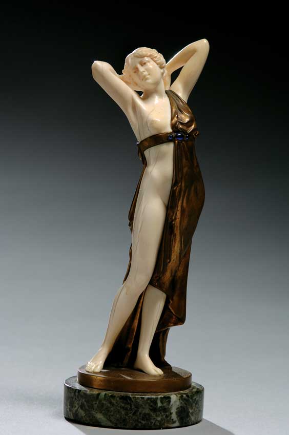 Appraisal: BRONZE AND IVORY BEAUTY BY PREISS Finely detailed Art Deco