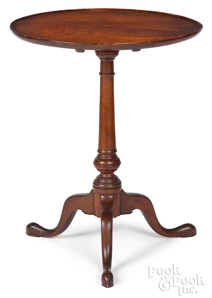 Appraisal: Pennsylvania Queen Anne tilting top candlestand Pennsylvania walnut Queen Anne