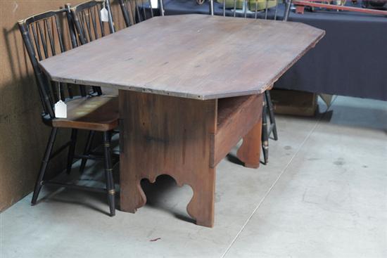 Appraisal: HUTCH TABLE Pine with canted corners two pins and shaped