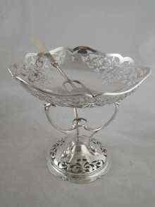 Appraisal: A silver Art Nouveau comport the pierced bowl on three