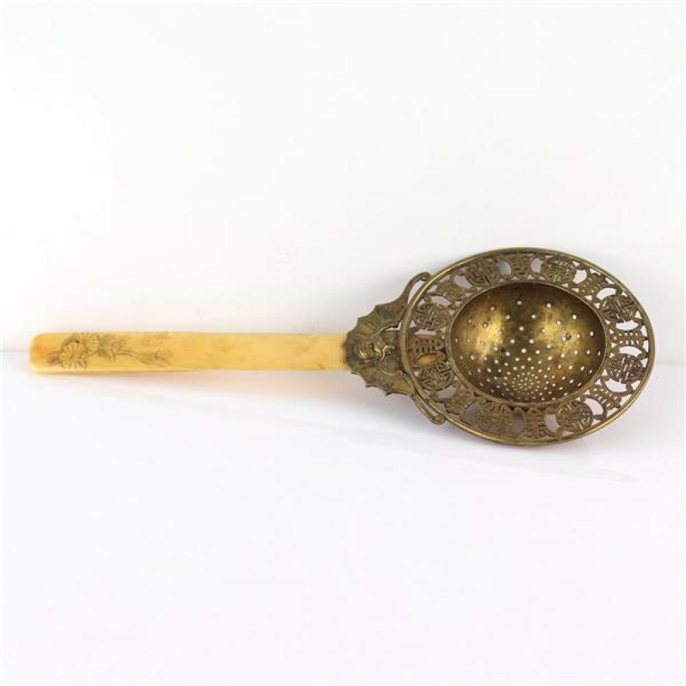 Appraisal: ANTIQUE CHINESE TEA STRAINER WITH CARVED AND SIGNED RAISED WATER