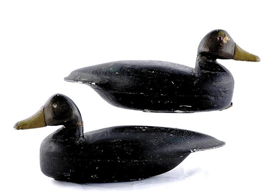 Appraisal: Pair of polychrome carved wood duck decoys weighted underbelly and