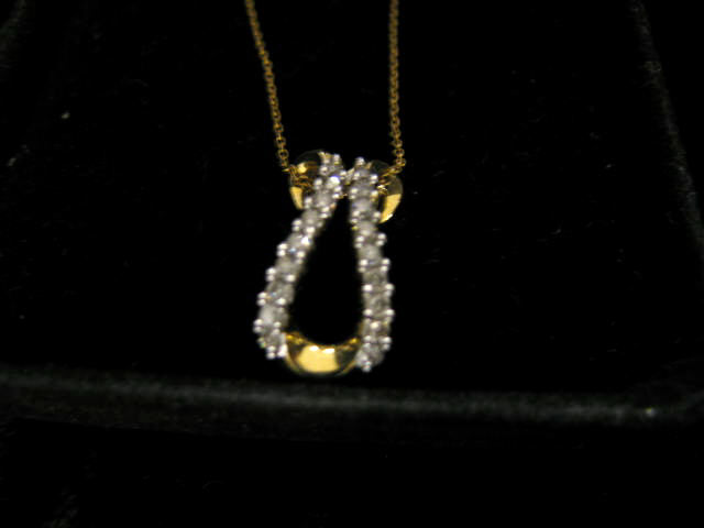 Appraisal: Diamond Pendant Diamonds totaling carat in k yellow gold