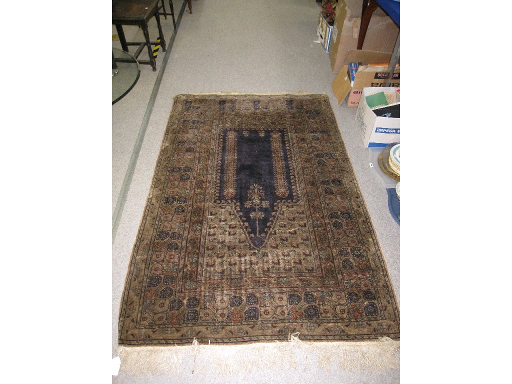 Appraisal: Eastern silk rug with large blue central medallion