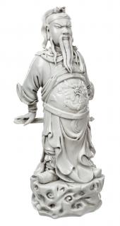 Appraisal: A BLANC-DE-CHINE FIGURE OF GUANDI the god of war is