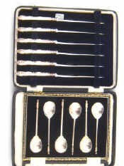 Appraisal: A boxed set of six silver coffee spoons with lion