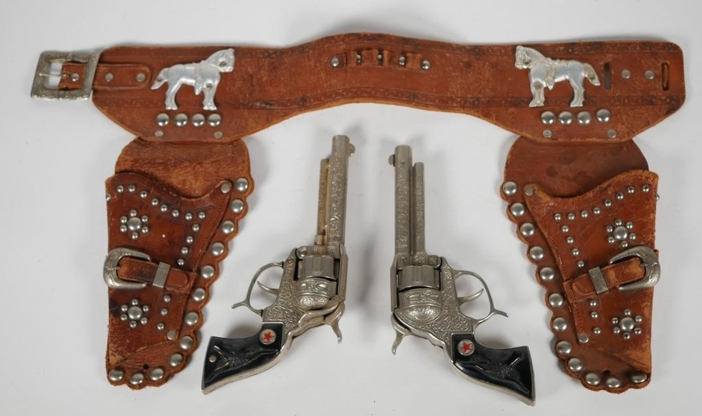 Appraisal: HUBLEY VINTAGE CAP GUNS IN KEYSTONE STYLE HOLSTERPair of Hubley