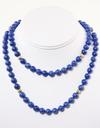 Appraisal: NECKLACE - Eighty-eight mm blue lapis beads and eight ribbed