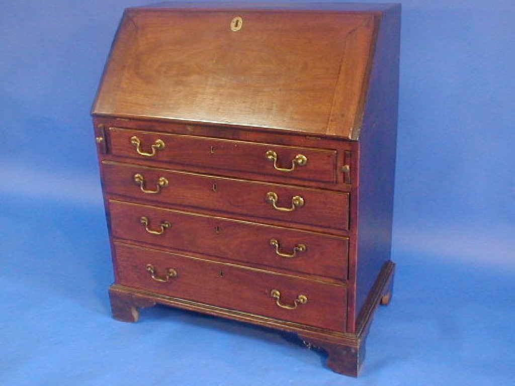 Appraisal: A George III mahogany bureau with fall flap revealing a