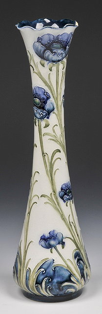 Appraisal: A MOORCROFT FLORIAN WARE SLENDER BALUSTER VASE cm high