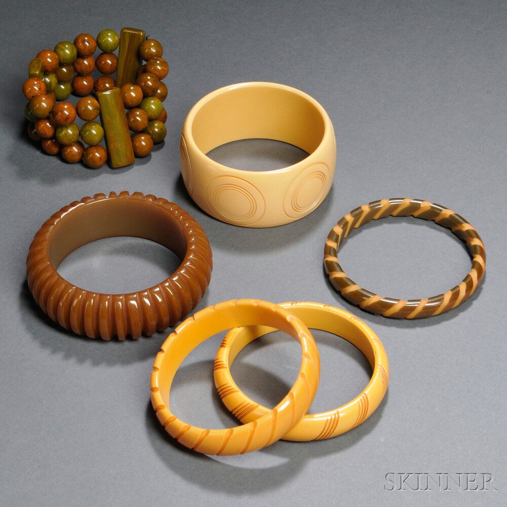 Appraisal: Six Bakelite Bracelets United States th century In butterscotch brown