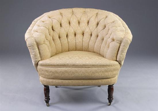 Appraisal: VICTORIAN CLUB CHAIR late th century Back-rolled crest rail counterposed