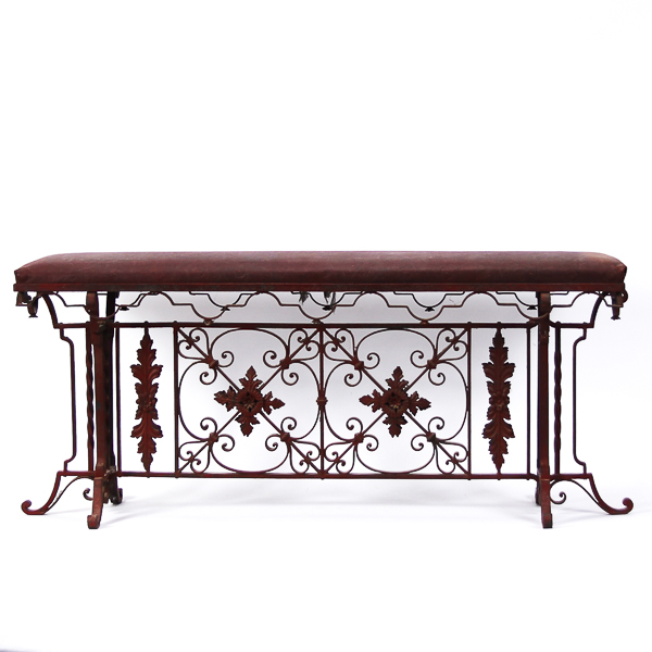 Appraisal: Gothic revival wrought iron long bench painted red with vinyl