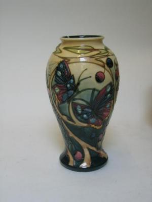 Appraisal: A MOORCROFT POTTERY VASE dated of baluster form tube lined