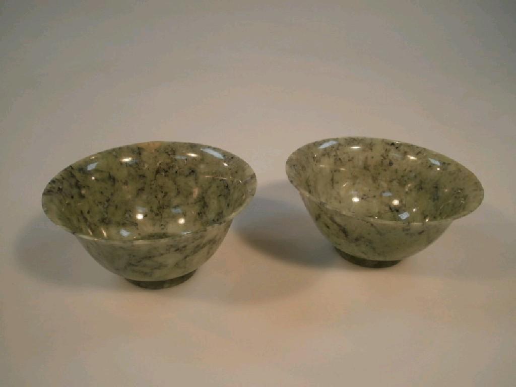 Appraisal: A pair of Chinese jade bowls cm diameter