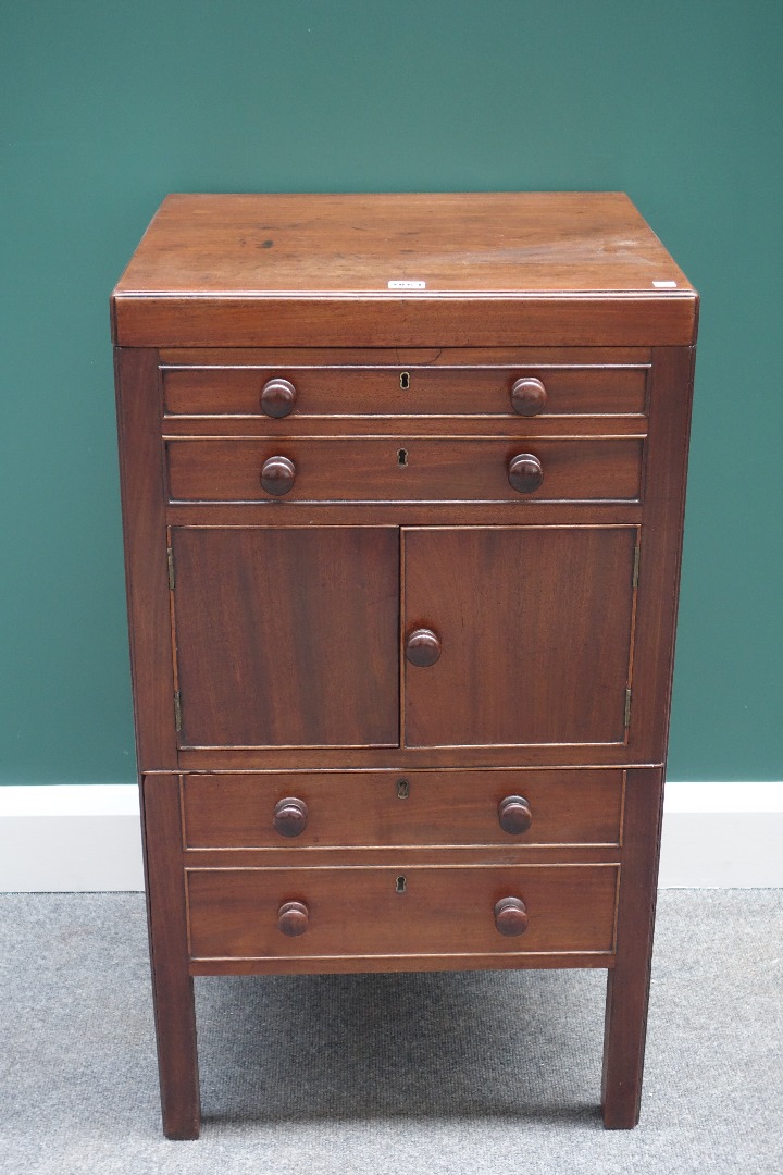 Appraisal: A George III mahogany gentleman's wash stand the lift top