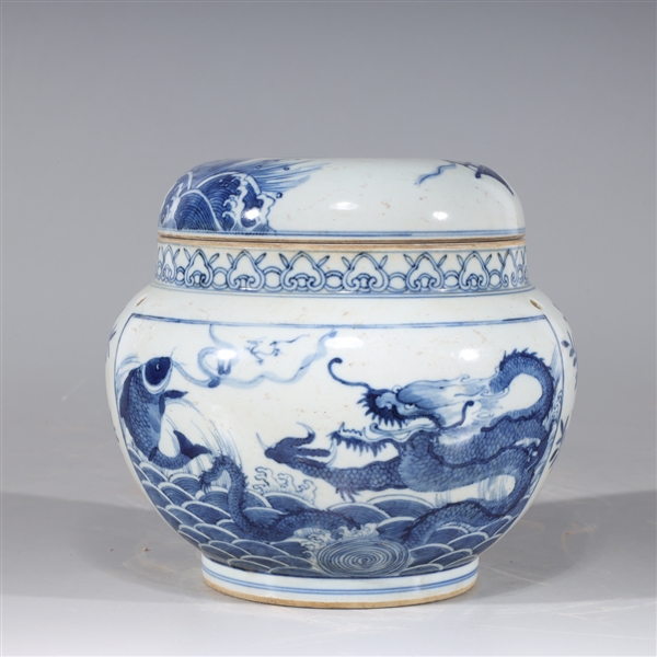 Appraisal: Chinese blue and white covered porcelain vessel with dragons fish