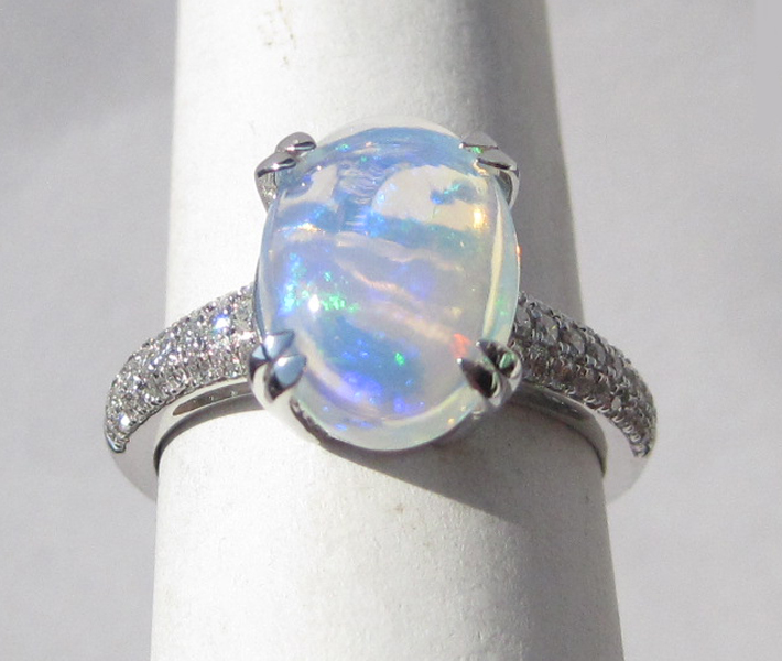 Appraisal: OPAL DIAMOND AND FOURTEEN KARAT GOLD RING The white gold