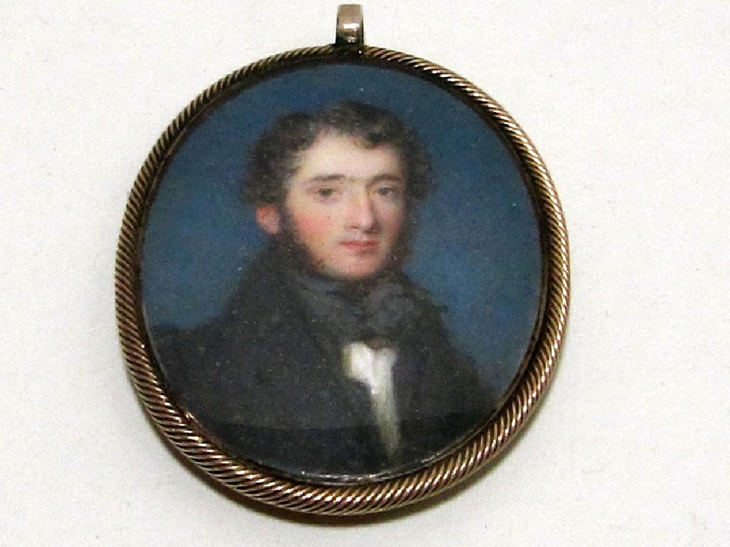 Appraisal: Victorian miniature of a gentleman in yellow metal pendant mount