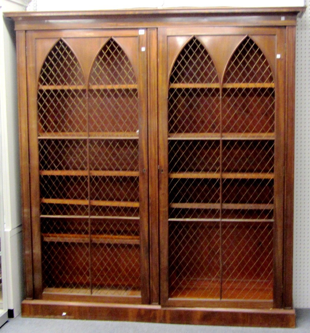 Appraisal: A Victorian mahogany floor standing bookcase with pair of grille