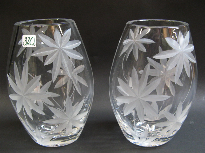 Appraisal: PAIR OF CUT CRYSTAL FLOWER VASES ovoid shape with gravic