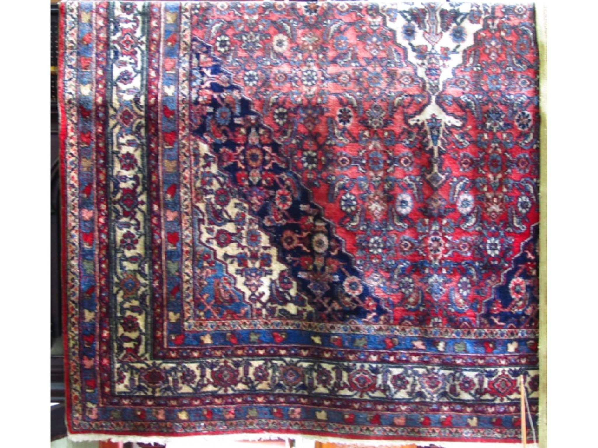 Appraisal: A Persian wool carpet in the Hamedan manner the central