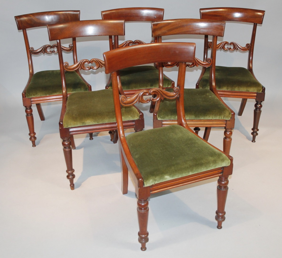 Appraisal: A set of six Victorian mahogany bar back dining chairs