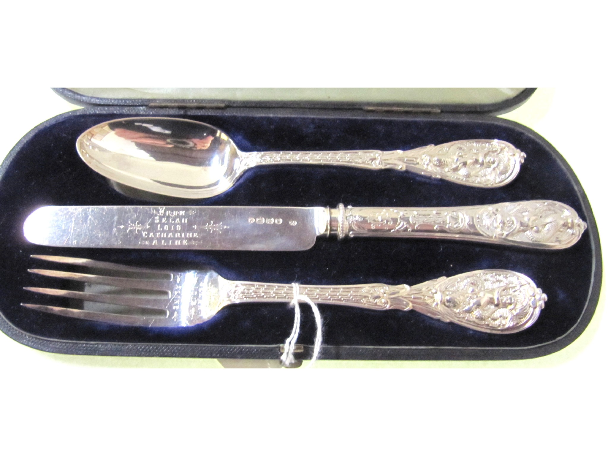 Appraisal: A cased three piece silver christening set London