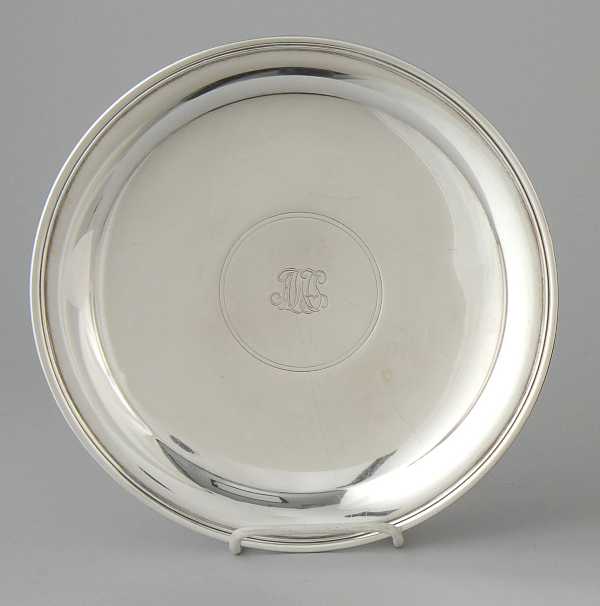 Appraisal: TIFFANY STERLING SILVER FOOTED TRAY With applied ribbed border Monogrammed