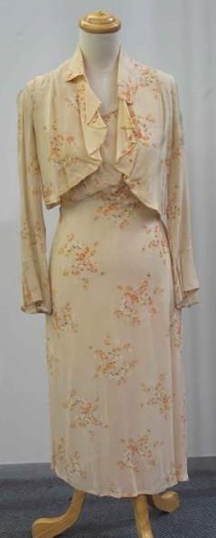 Appraisal: Afternoon ensemble in floral printed apricot rayon comprising a dress