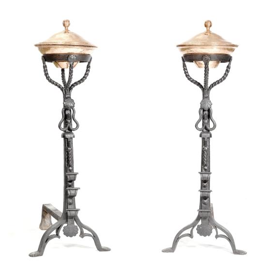 Appraisal: PAIR OF FIREPLACE CHENETS th century Forged iron and copper