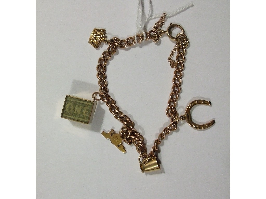 Appraisal: Nine carat rose gold charm bracelet with five various gold