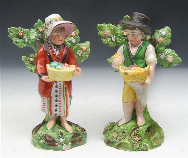 Appraisal: A PAIR OF WALTON SCHOOL FIGURES of children each set