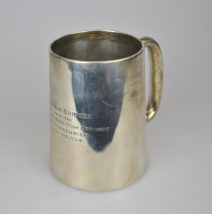 Appraisal: A silver half-pint Christening mug Walker Hall Birmingham oz