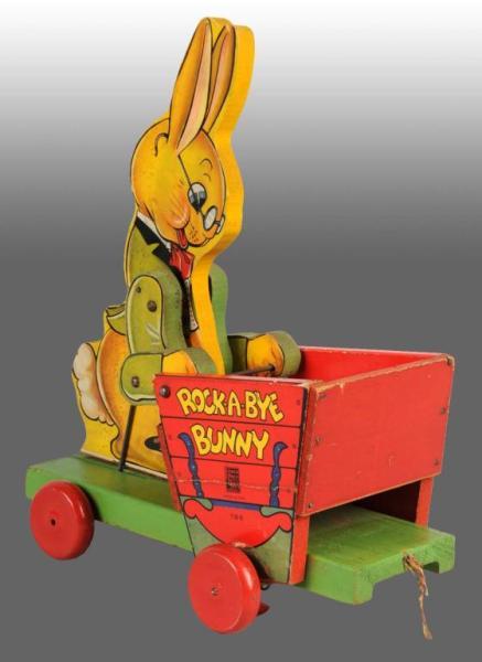 Appraisal: Fisher Price No Rock-A-Bye Bunny Cart Toy Description American Minimal