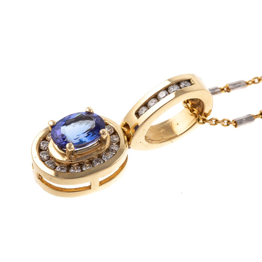 Appraisal: A Tanzanite Diamond Halo Pendant in K K yellow gold