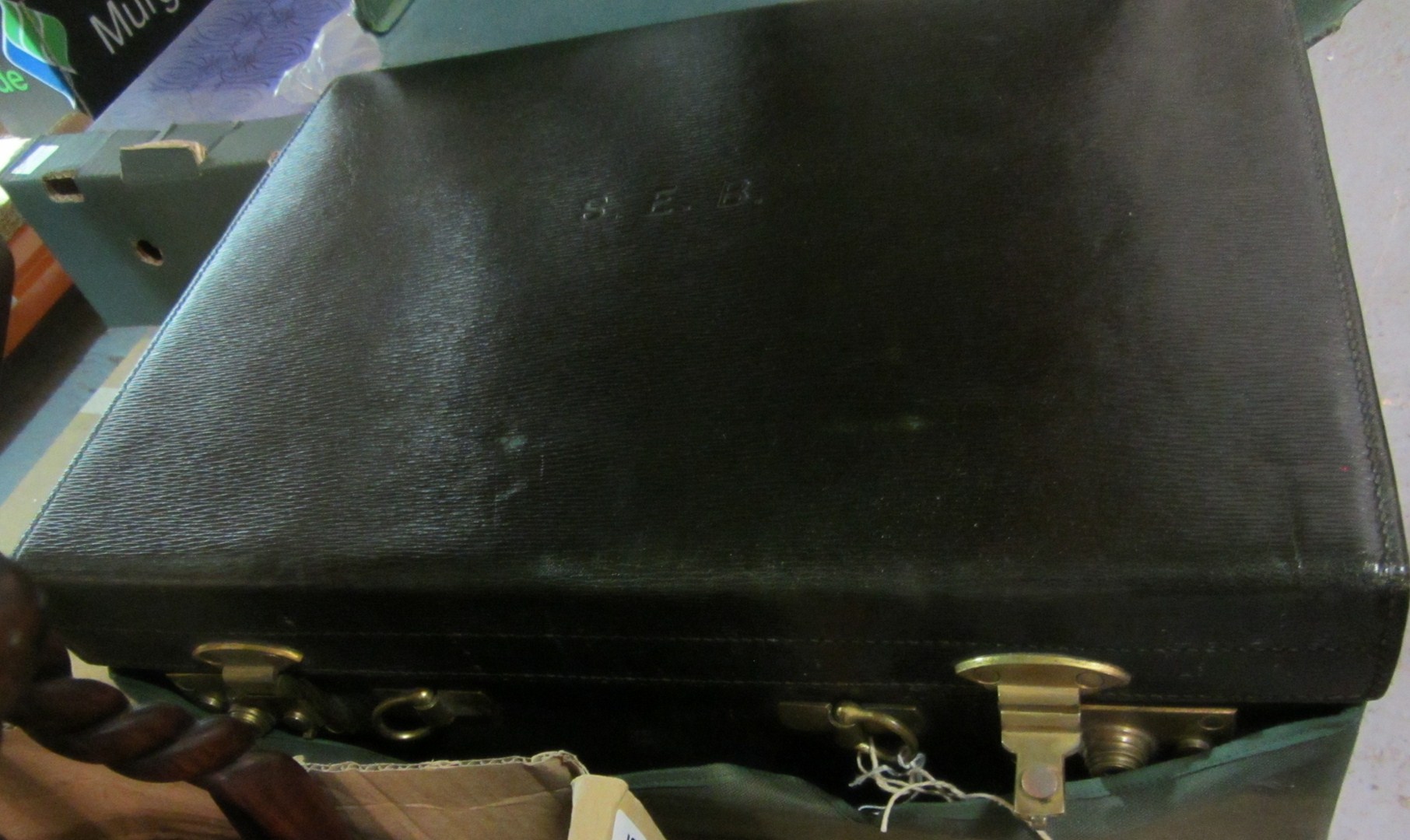 Appraisal: A black leather Mappin Webb travelling vanity case lacking internals