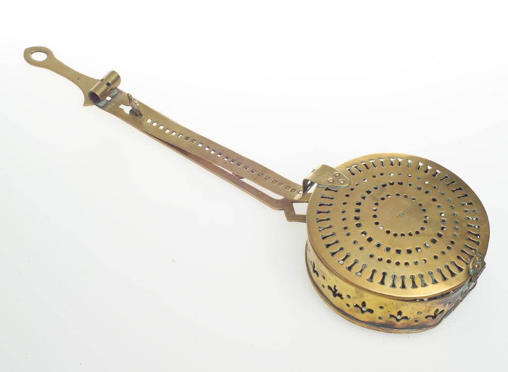 Appraisal: th CENTURY BRASS CHESTNUT ROASTER with pierced scroll handle cm