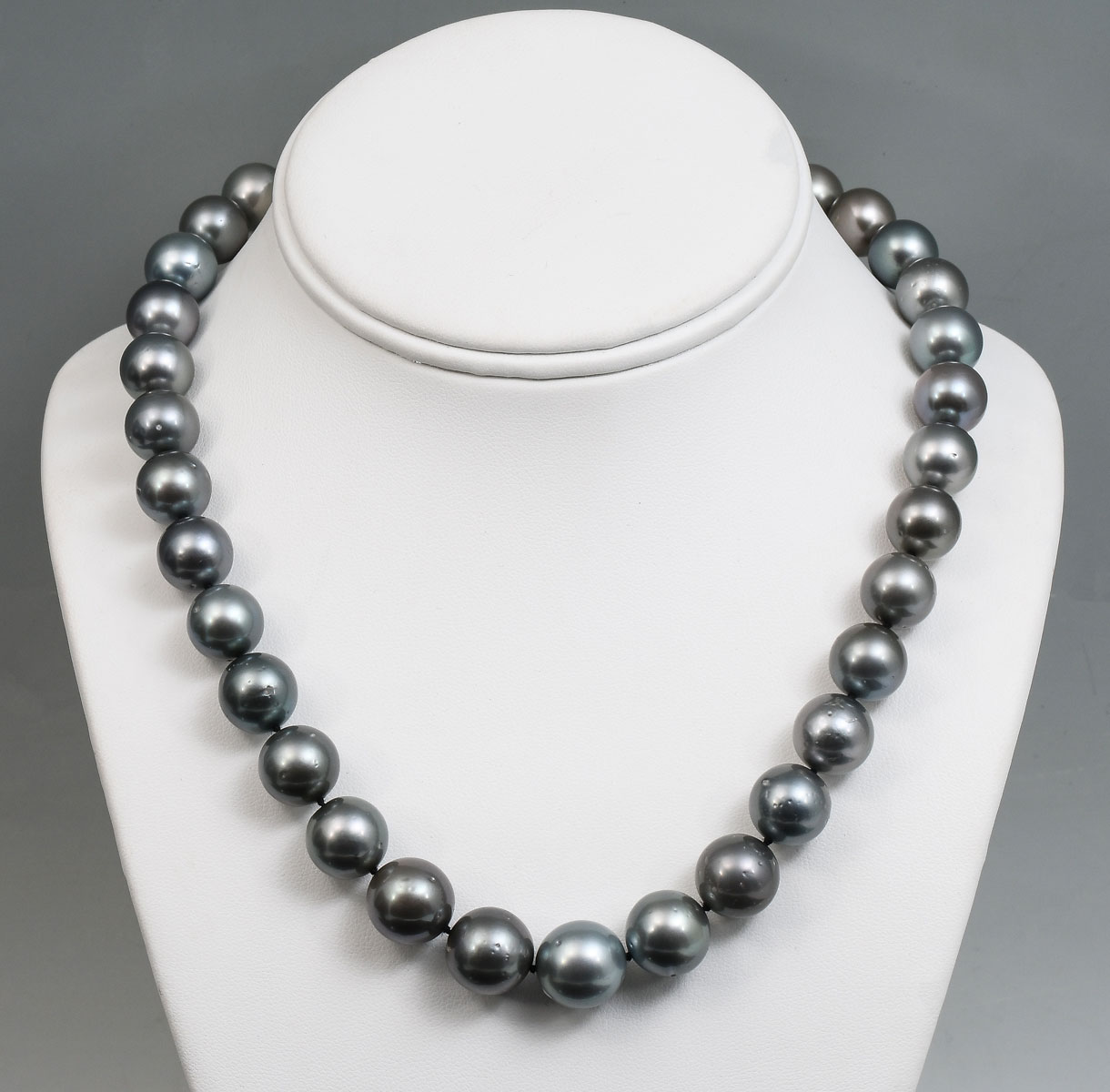 Appraisal: TAHITIAN BLACK CULTURED PEARL NECKLACE Hand knotted Tahitian black pearl