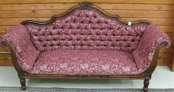 Appraisal: REGENCY STYLE MAHOGANY SCROLL-END SOFA with serpentine crest-rail over a