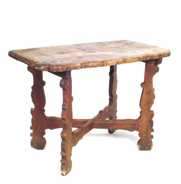 Appraisal: An Italian Baroque style walnut side table incorporating th century