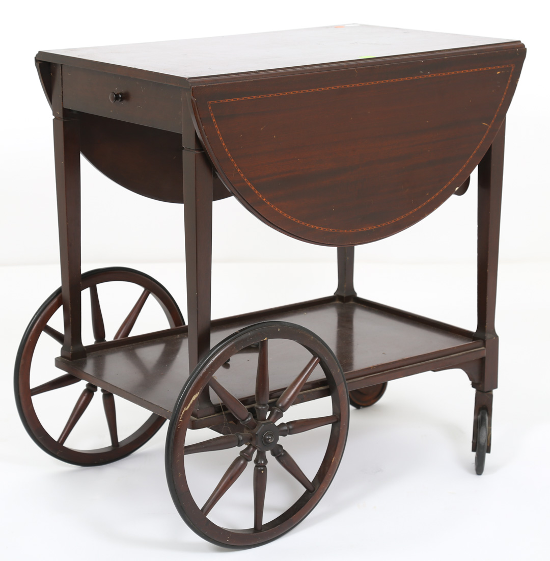 Appraisal: Mahogany tea cart