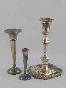 Appraisal: A silver candlestick in the early Georgian style ht cm