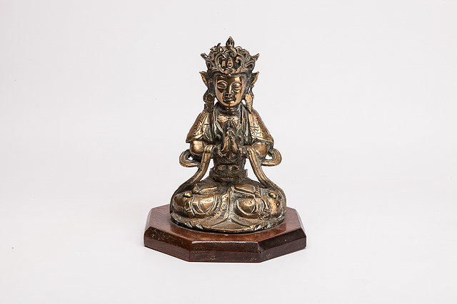 Appraisal: AN TH CENTURY CHINESE POLISHED BRONZE FIGURE of a Deity