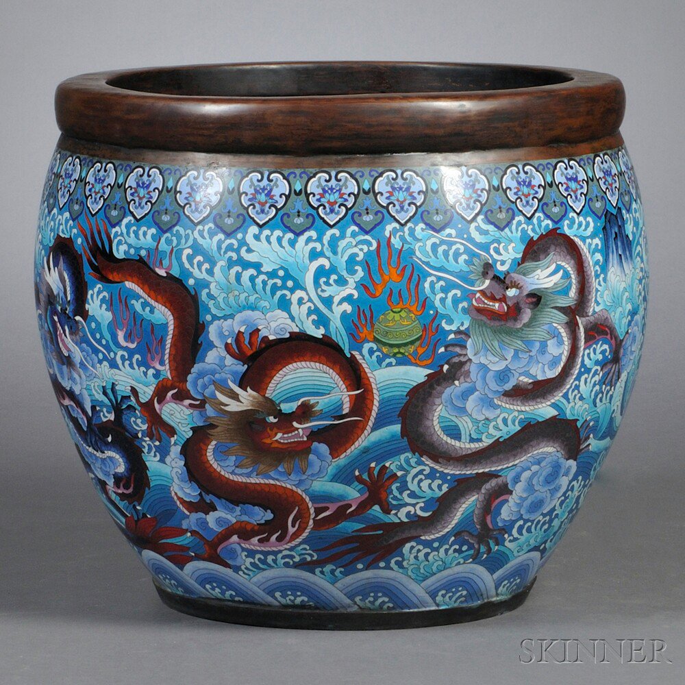 Appraisal: Cloisonne Jardiniere China th century decorated with dragons chasing flaming