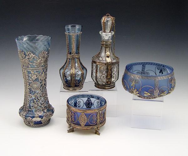 Appraisal: METAL MOUNTED GLASS VASES Cast metal mountings over blue glass