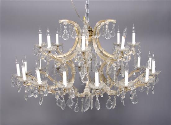 Appraisal: A Gilt Metal and Glass Twenty-Four Light Chandelier Approximate overall