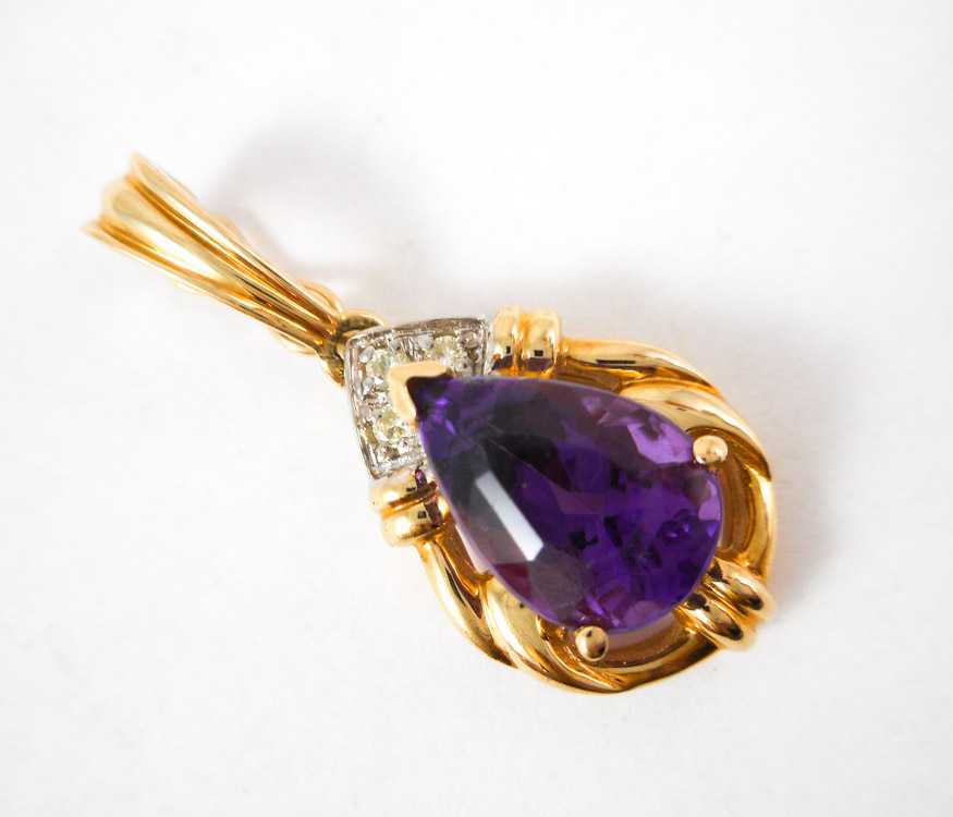 Appraisal: AMETHYST DIAMOND AND FOURTEEN KARAT GOLD PENDANT yellow and white